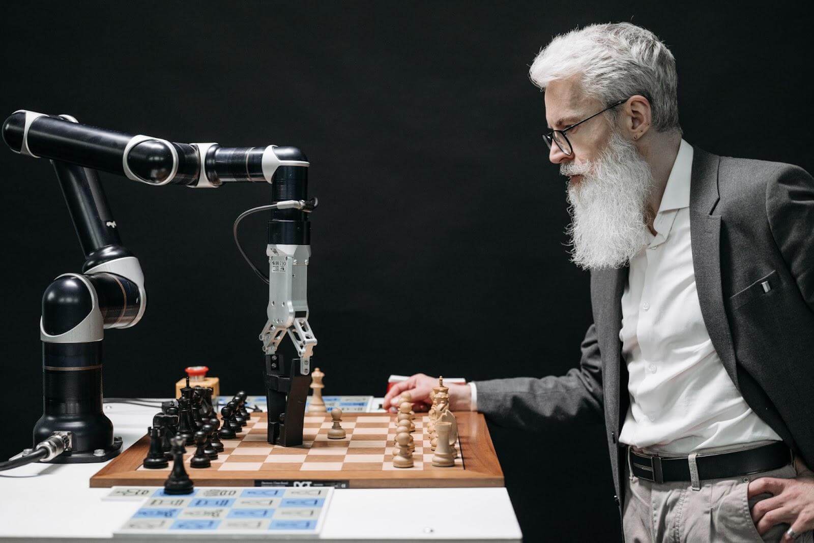 photo about man play chess with machine AI